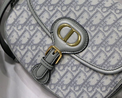 MEDIUM CD BOBBY 22CM GREY OBLIQUE CANVAS GOLD HARDWARE