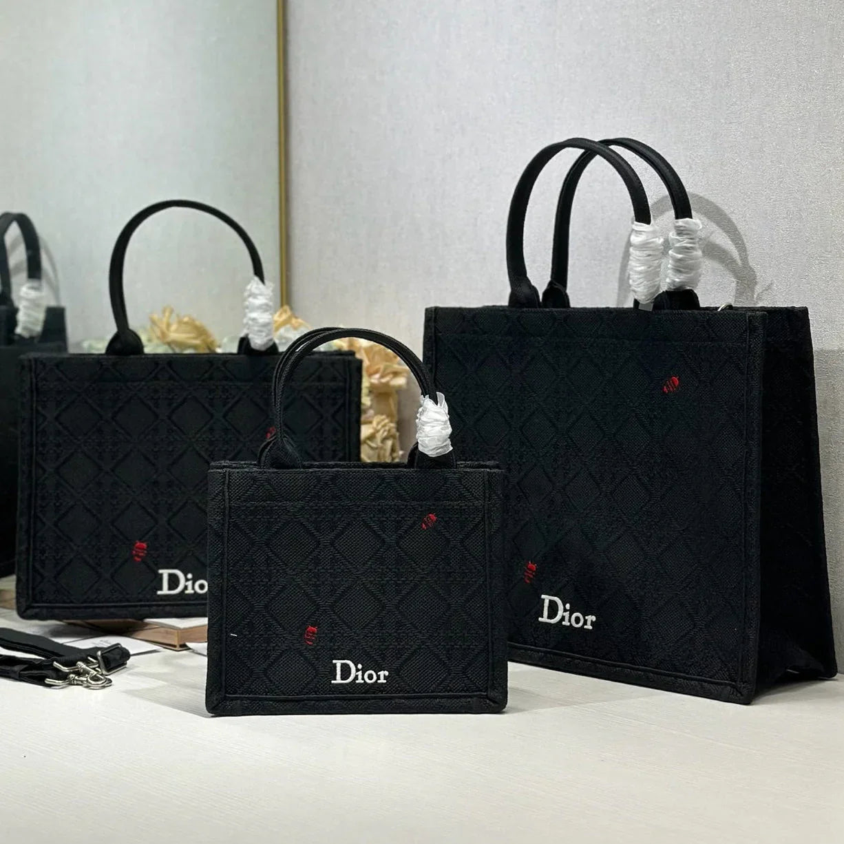 CD 2026 Book Tote Bag With Red Beetle-shaped Embellishments Black Canvas 288481