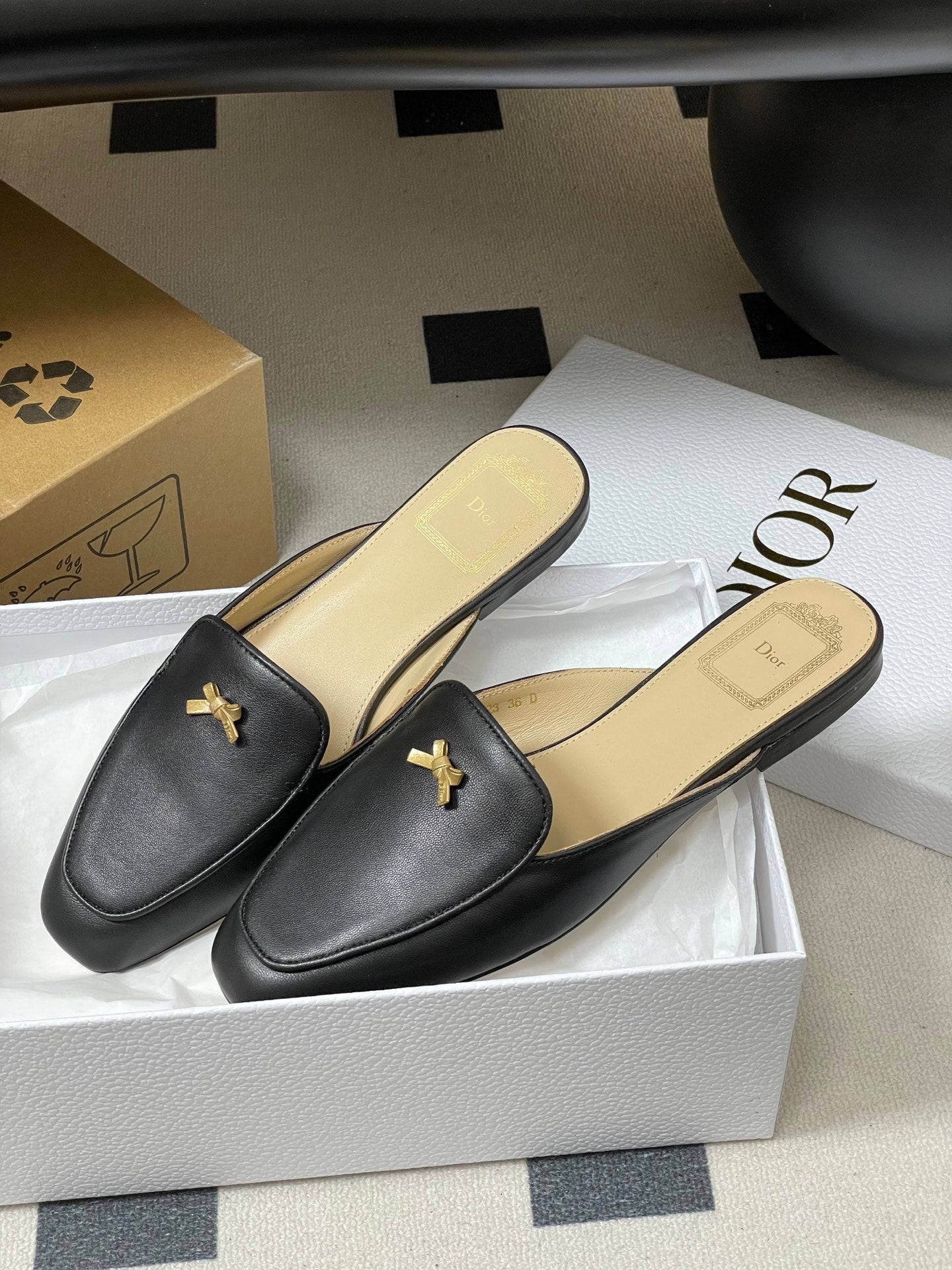 CD 26 Baby Bow Flat Mule Black Cowhide Sheepskin 632597