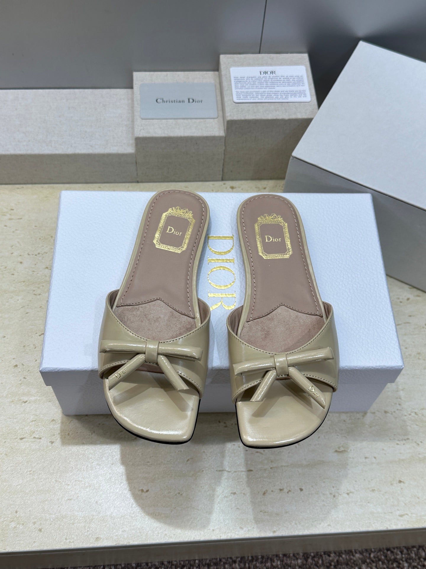 CD Dior Bow Slides Beige Leather 884659