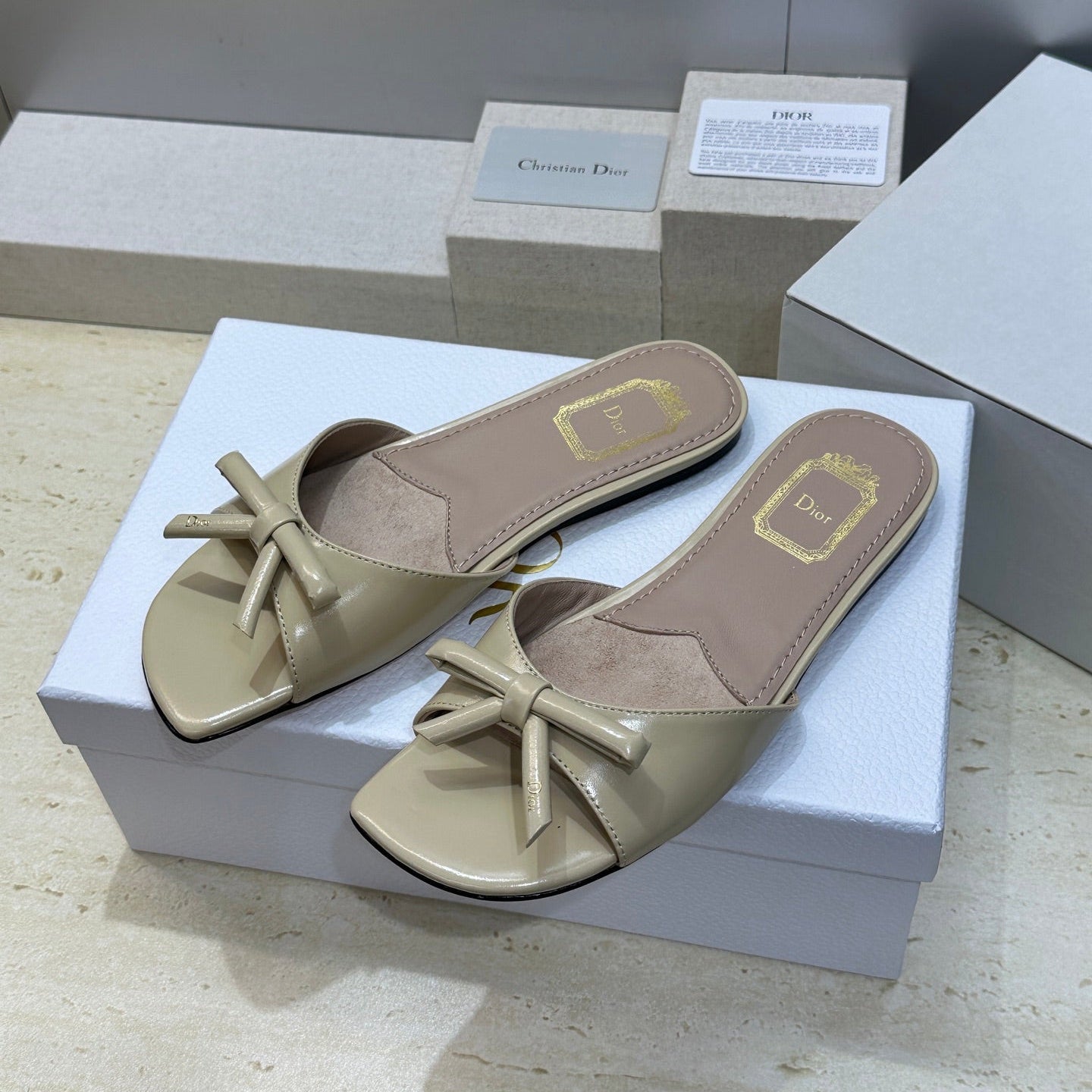 CD Dior Bow Slides Beige Leather 884659