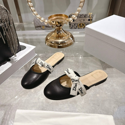 CD 26 Bow Flat Mules Embroidered Sheepskin